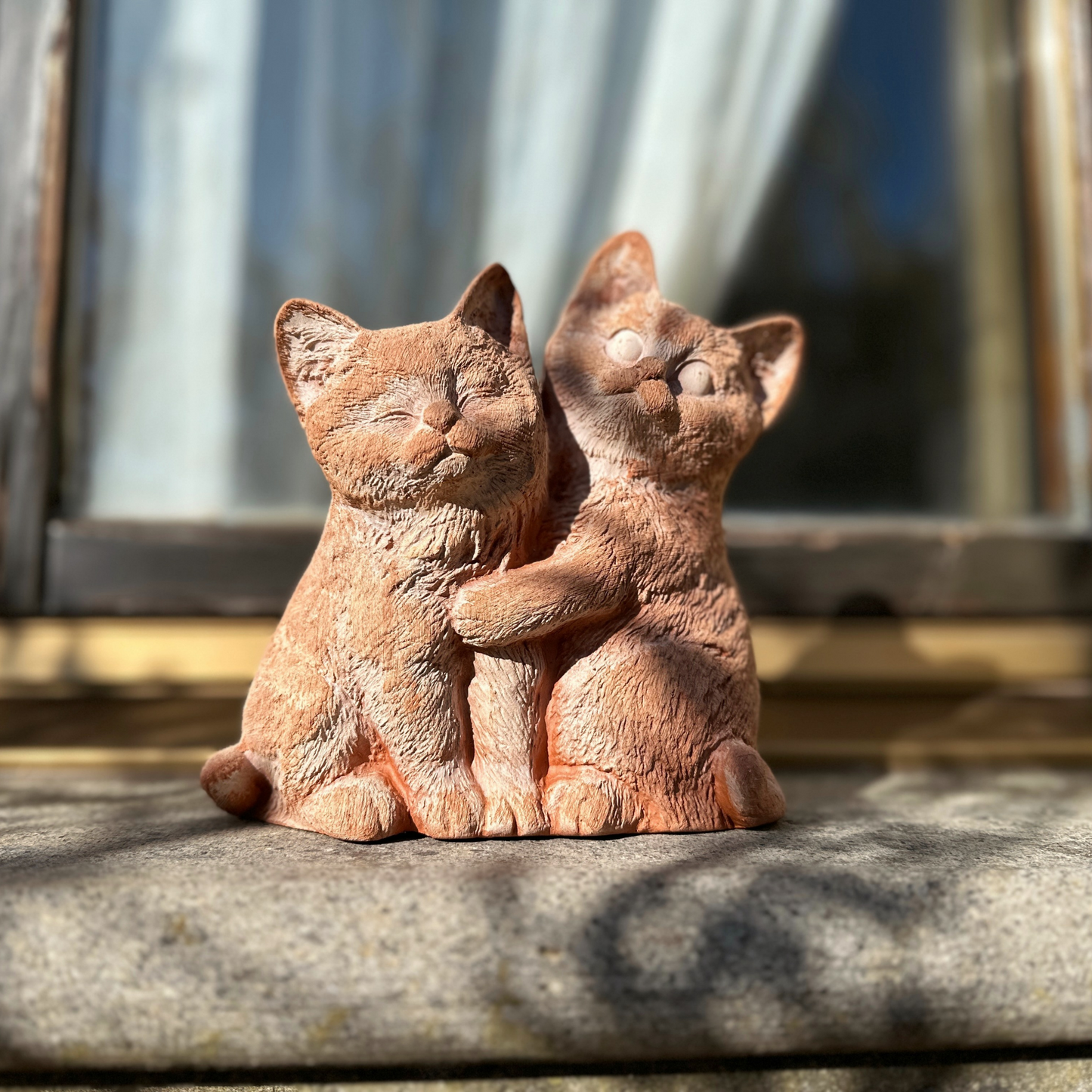 Pair of handcrafted terracotta cats for garden furniture, unique weatherproof decoration