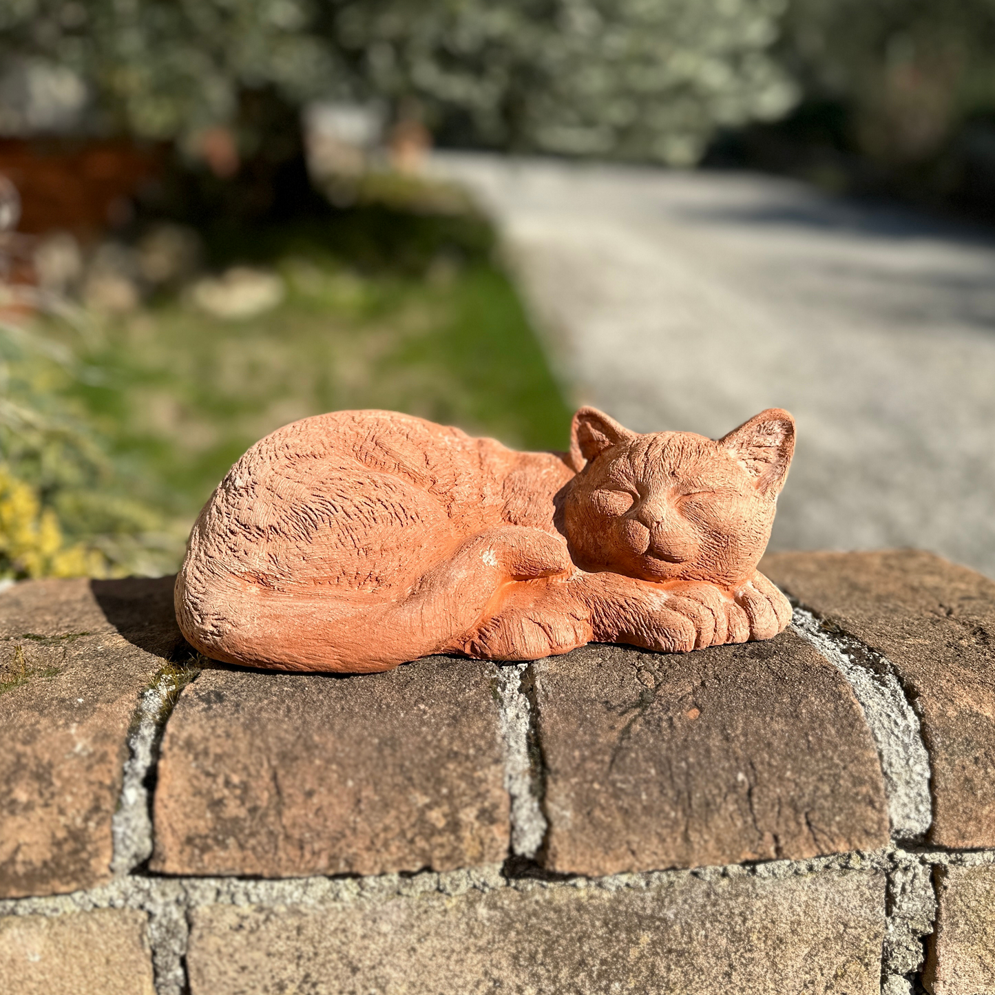 Sleeping cat in handcrafted terracotta for garden furniture, unique weatherproof decoration