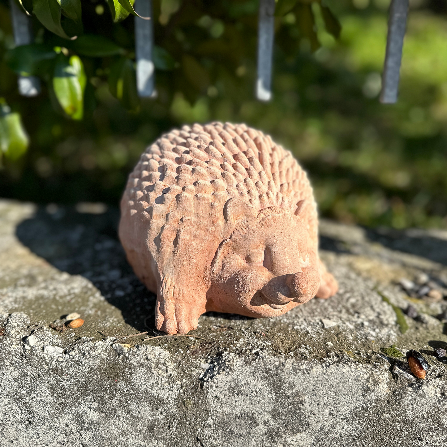 Handcrafted terracotta hedgehog for garden furniture, unique weatherproof decoration