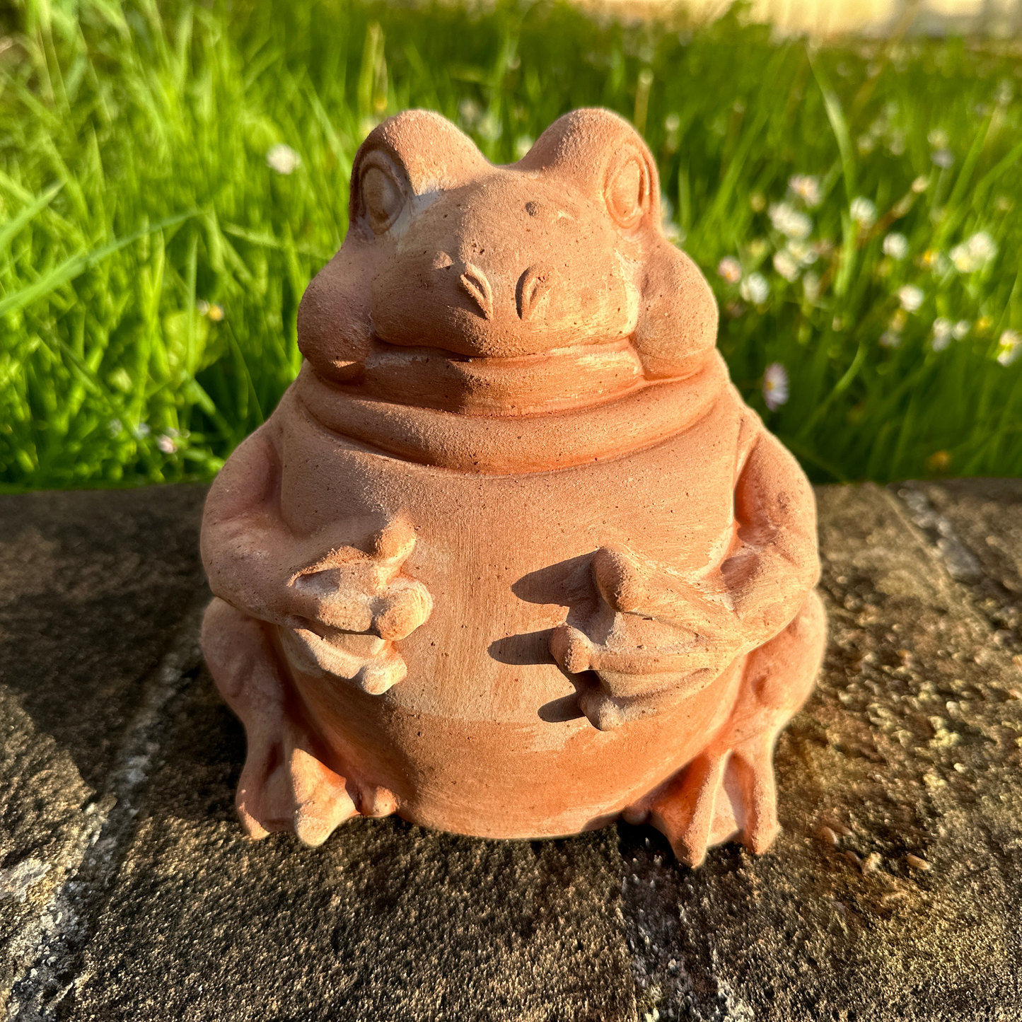 Handcrafted terracotta ball toad for garden furniture and weatherproof home decoration